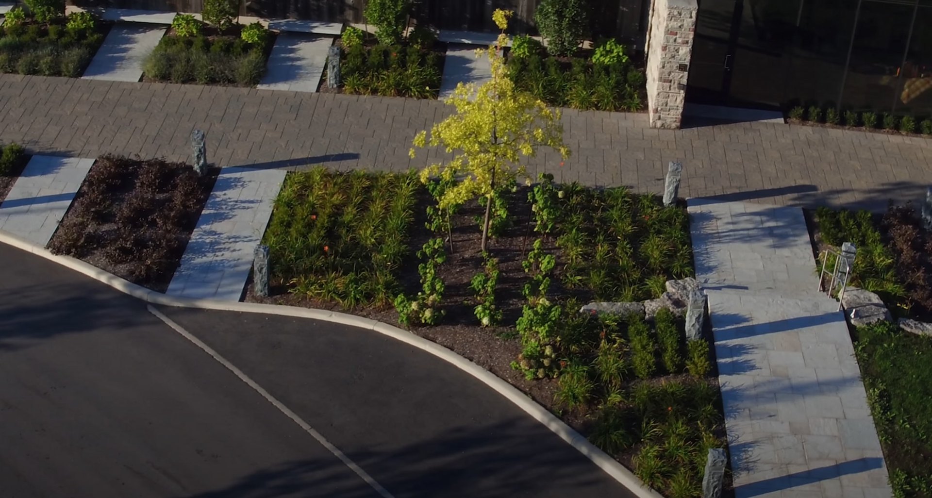 Professional hardscaping with stone pathways and retaining walls